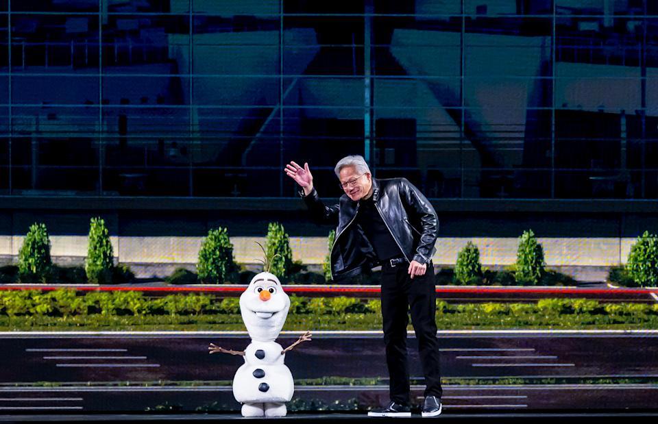 Nvidia CEO Jensen Huang interacts with a Disney animatronic robot during his keynote address at the company's annual GTC developers conference in San Jose, Calif., on March 16, 2026. (Josh Edelson/AFP via Getty Images) · JOSH EDELSON via Getty Images
